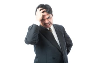 頭抱える経営者